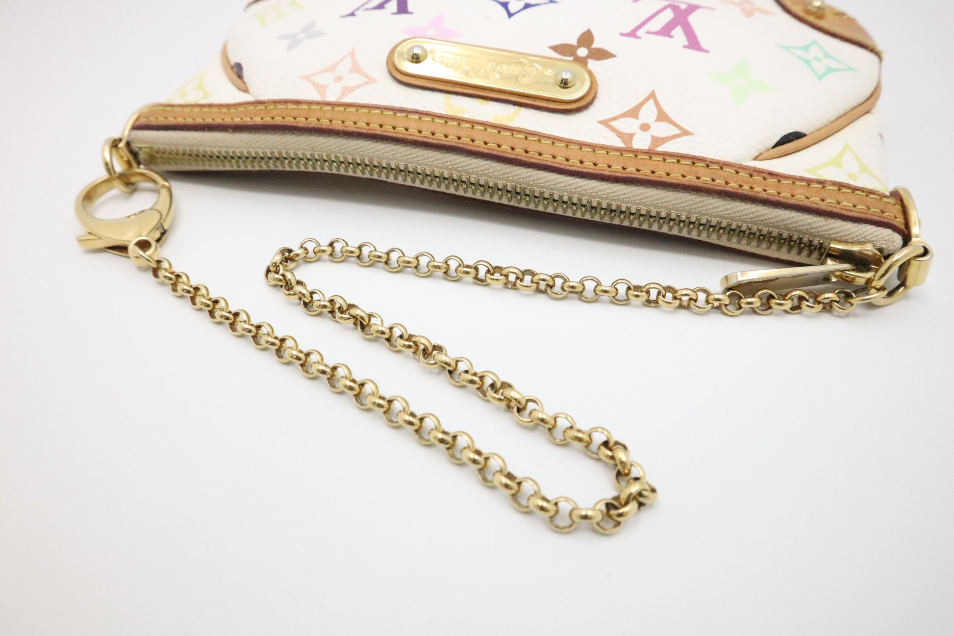 Louis Vuitton Pochette Milla MM in White Multicolor Monogram Canvas