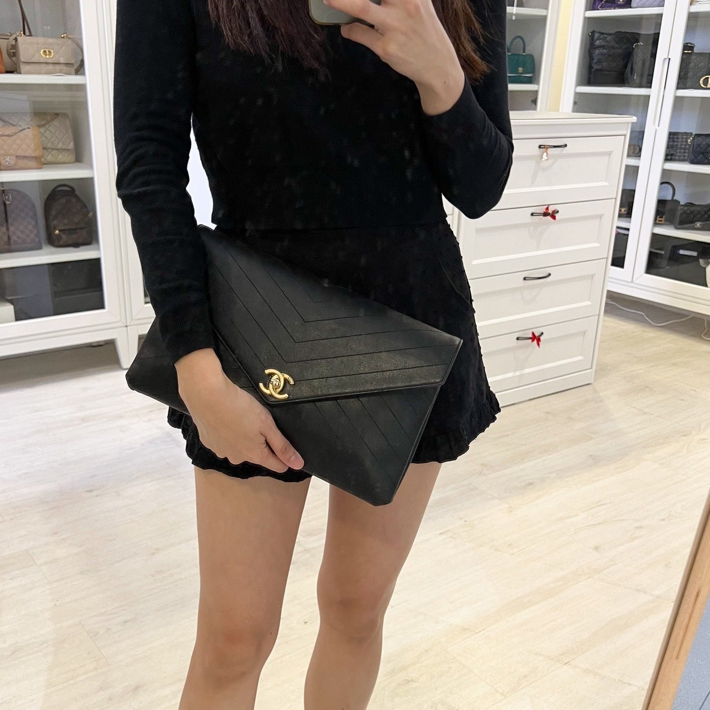 Chanel Clutch in Chevron Quilted Black Calf Leather and AGHW