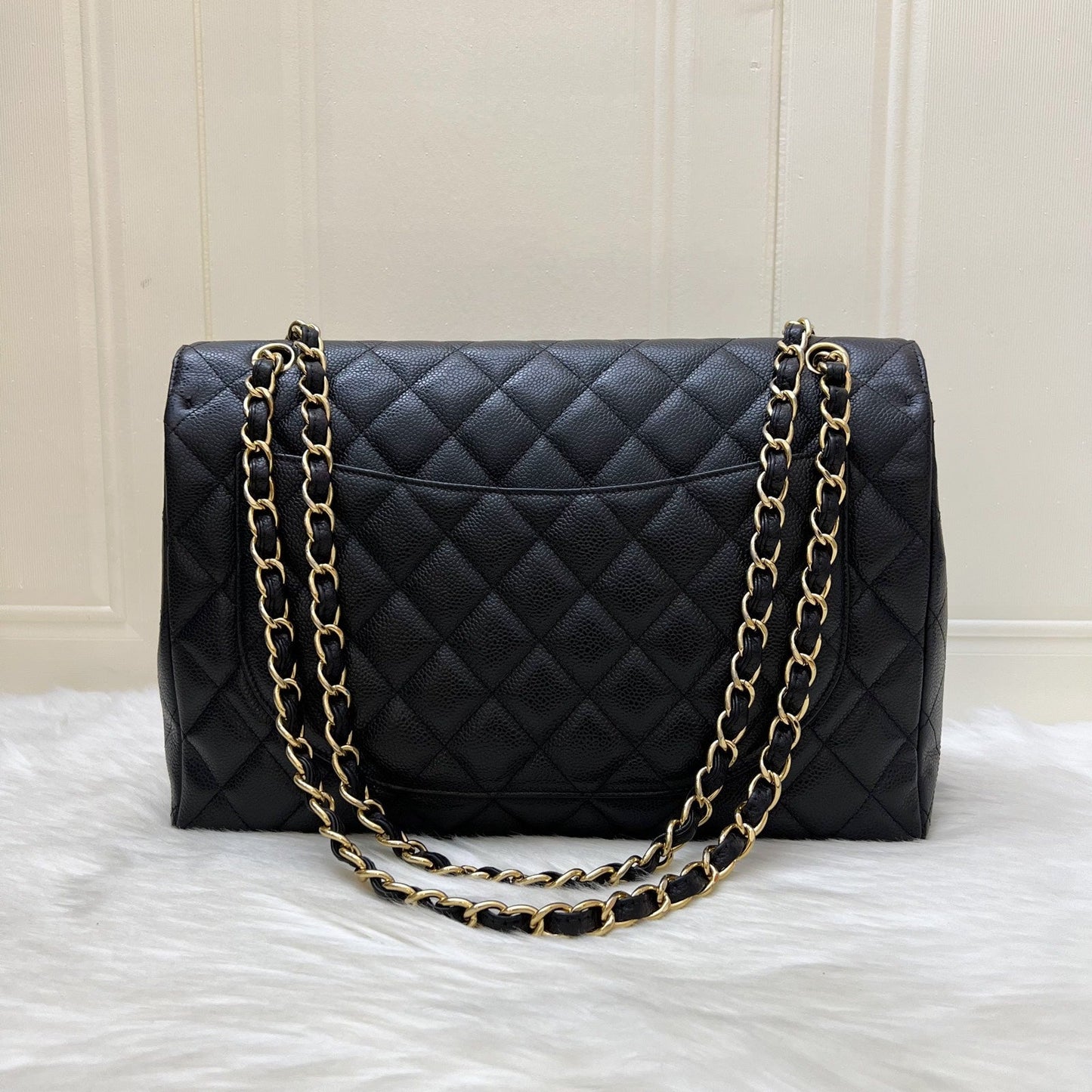 Chanel Maxi Classic Single Flap Bag in Black Caviar and GHW