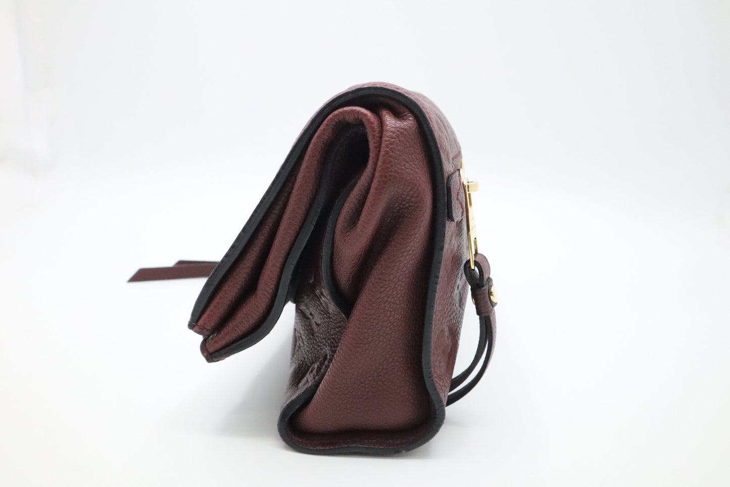 Louis Vuitton Petillante Clutch in Flamme Empreinte Leather
