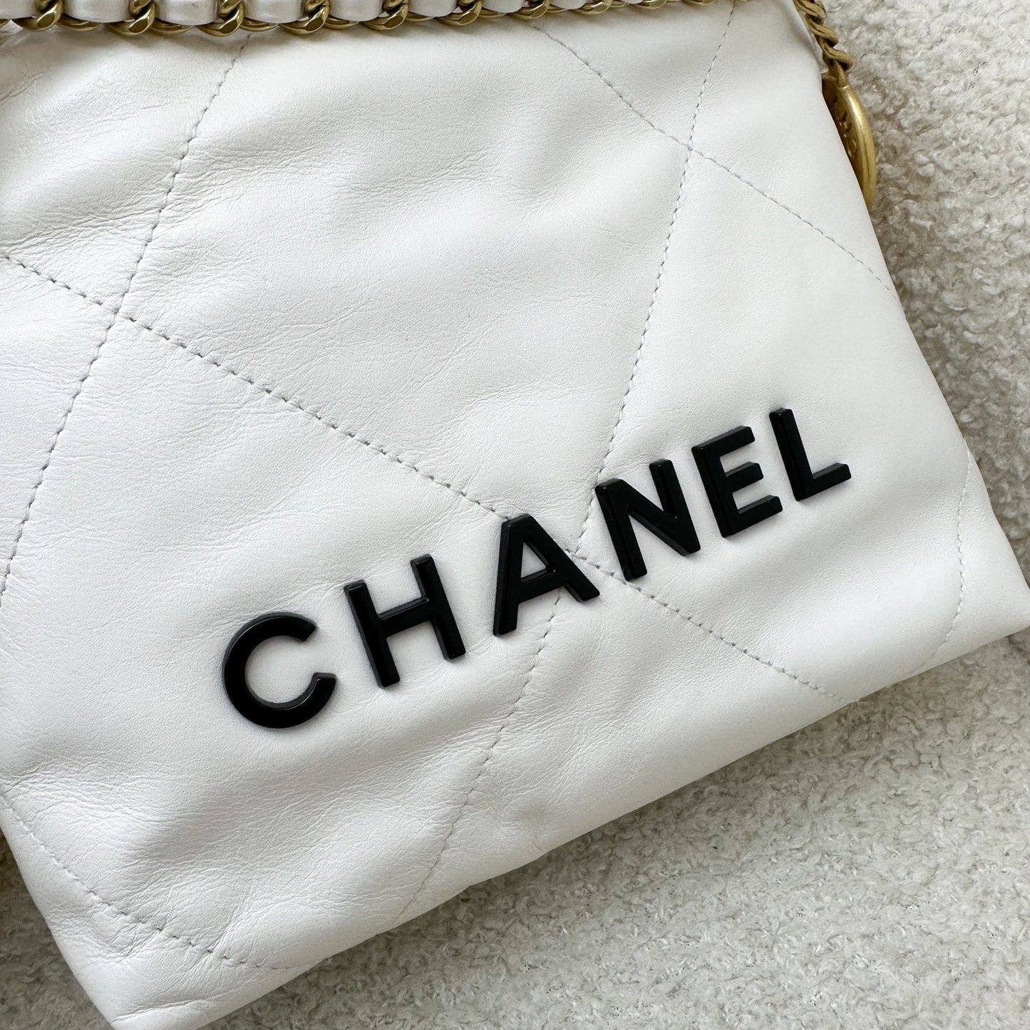Chanel 22 Mini Hobo Bag in White Calfskin and GHW with Black Logo