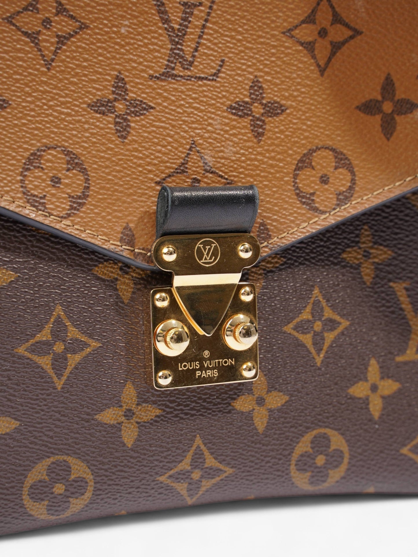 Louis Vuitton Pochette Metis Monogram Reverse Coated Canvas