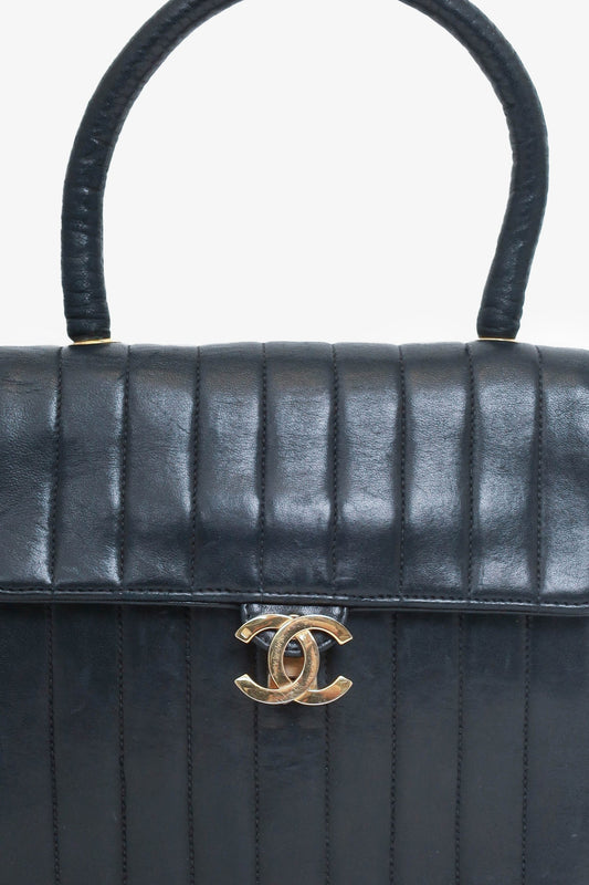 Chanel 1991-94 Black Vertical Quilted Lambskin Top Handle Bag