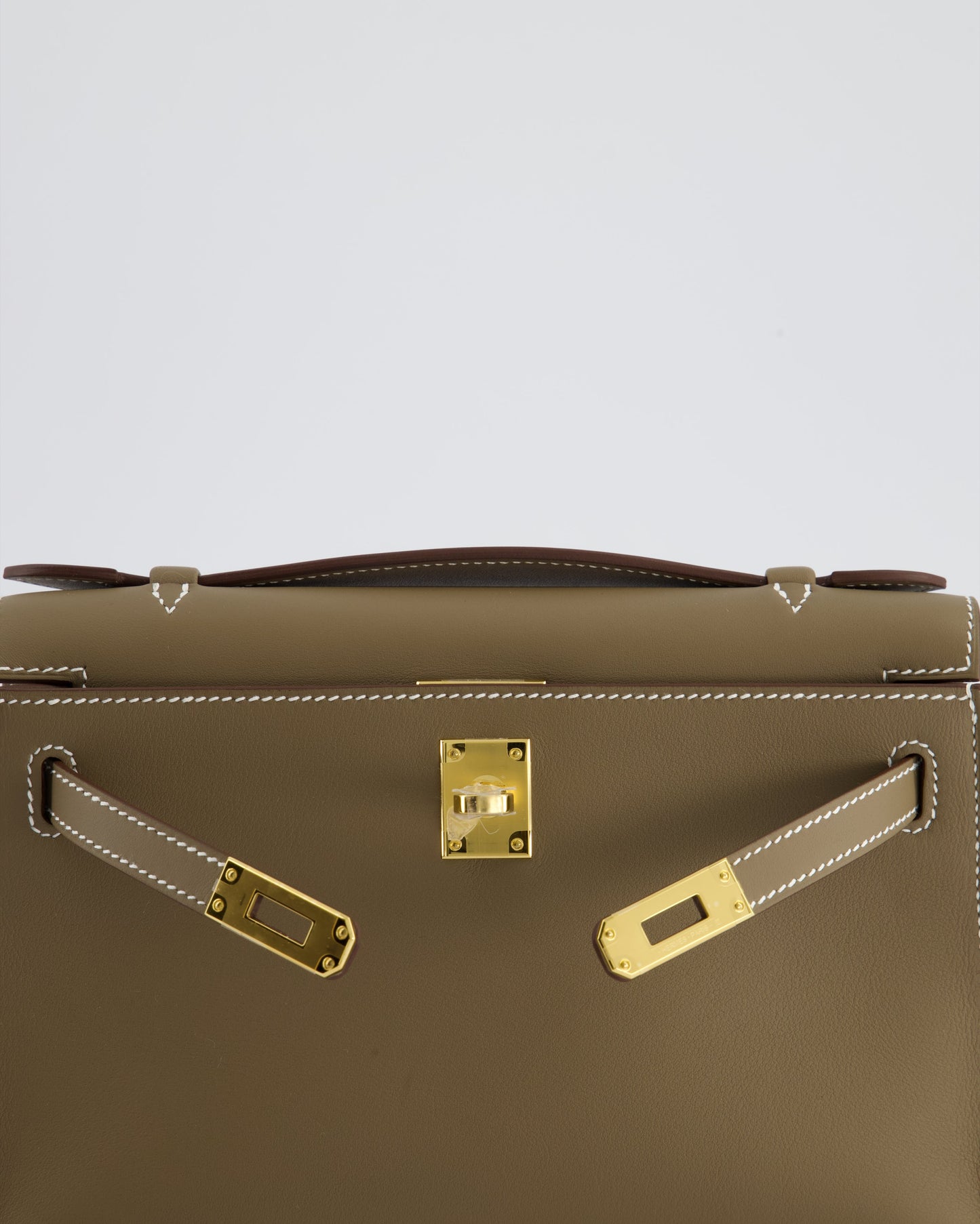 Hermes Kelly Pochette Bag in Etoupe Swift Leather and Gold Hardware
