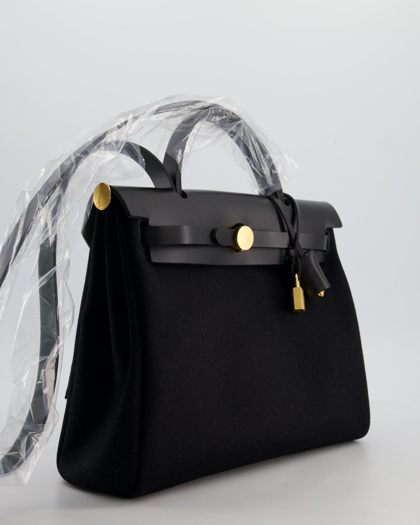 Hermes Herbag 31 Zip Bag in Noir Toile Officier Canvas, Noir Vache Hunter Leather with Gold Hardware