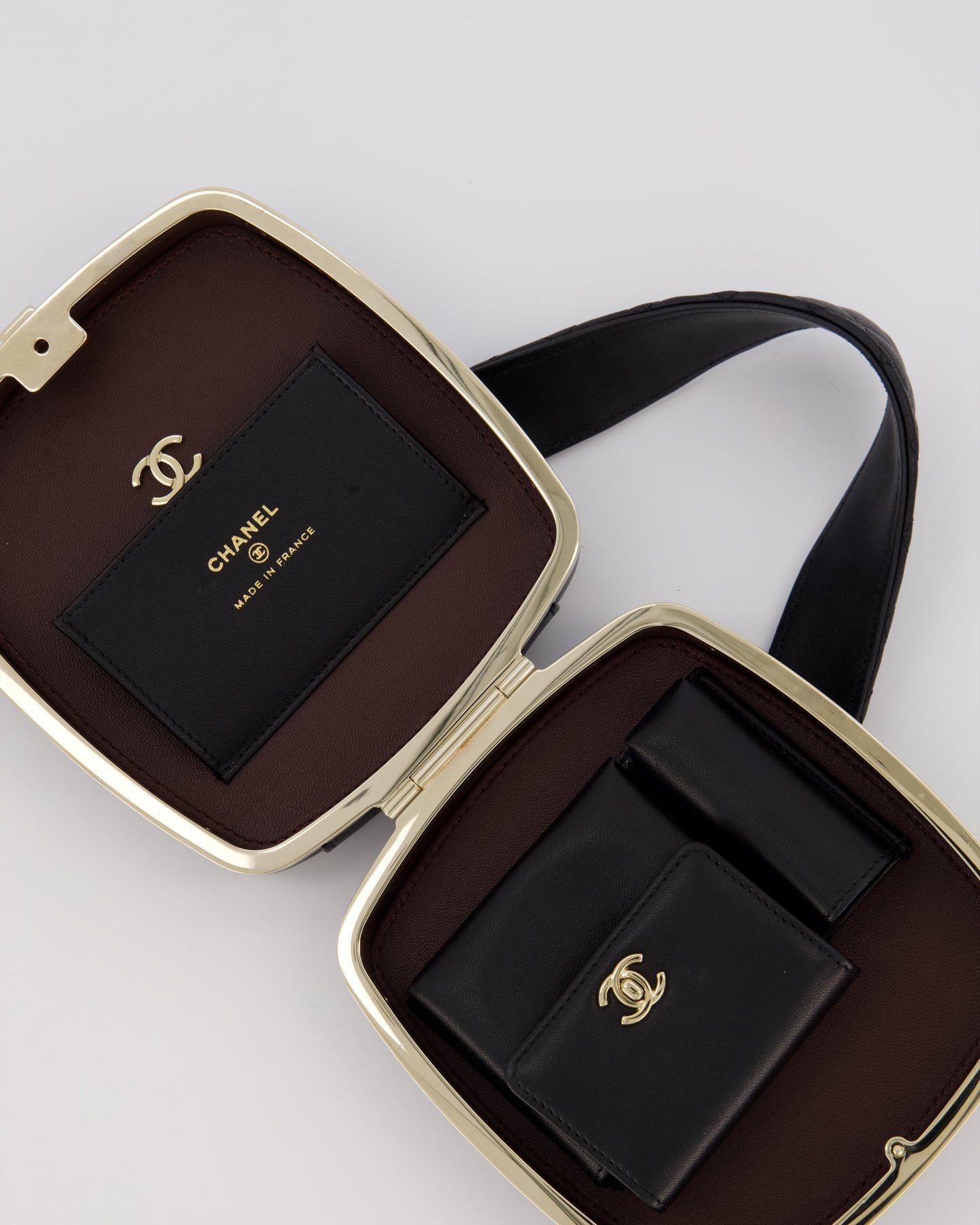 Chanel 22P Makeup Top Handle Clutch Bag in Black Lambskin with Champagne Gold Hardware and CC Logo Detail