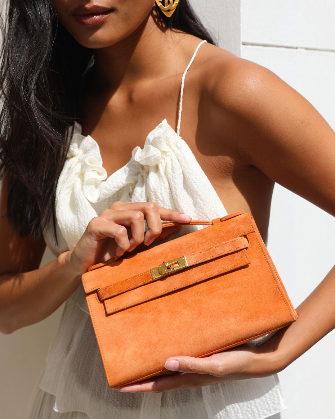 Hermes Vintage Mini Kelly Pochette Bag in Orange Veau Doblis Leather with Gold Hardware