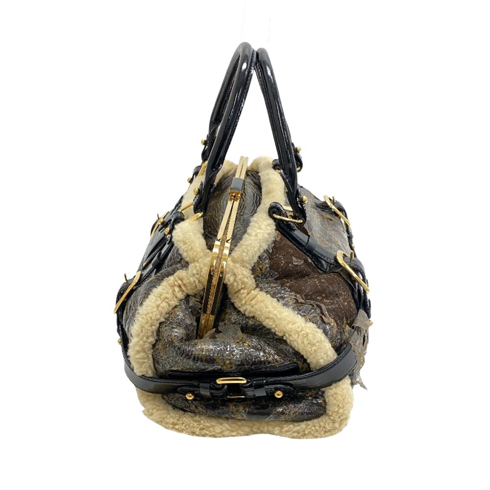LOUIS VUITTON Mini Boston Duffel bag Patent Leather, Sheepskin Brown Handbag monogram shearling storm Women