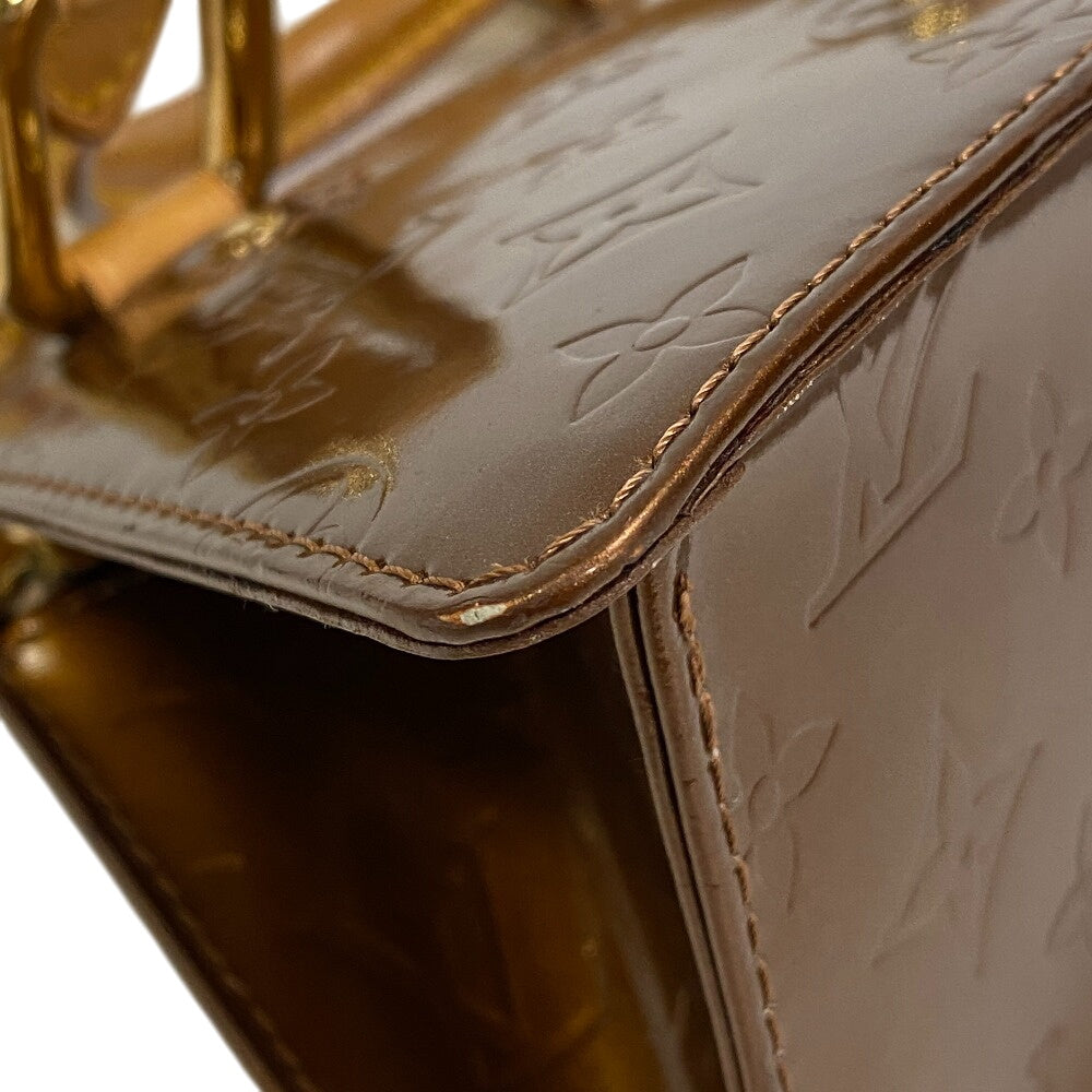 LOUIS VUITTON Handbag Patent leather, leather Brown Monogram Vernis Mini Four Size