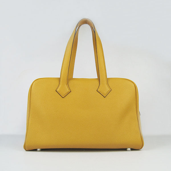 Luxury Hermes Togo leather handbag yellow