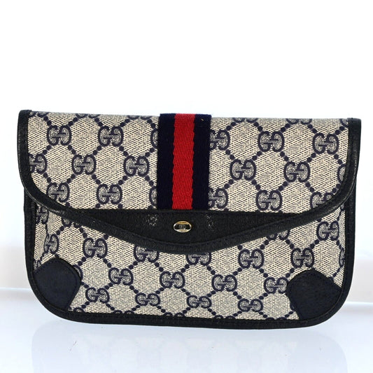 Gucci Leather Canvas Clutch