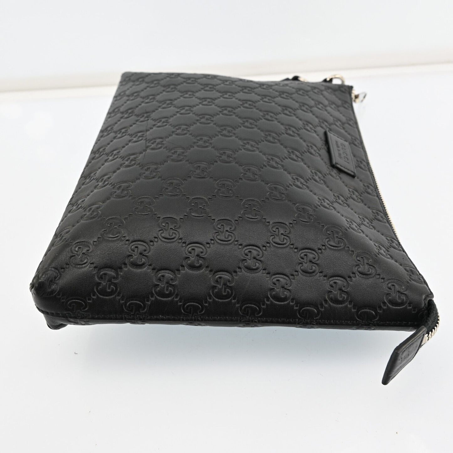 Gucci Monogram Leather Clutch