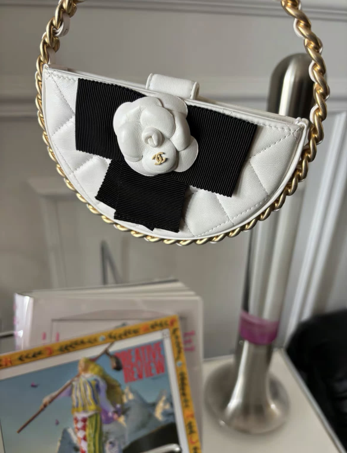 Chanel 23 White Quilted Leather Mini Round Camellia Clutch