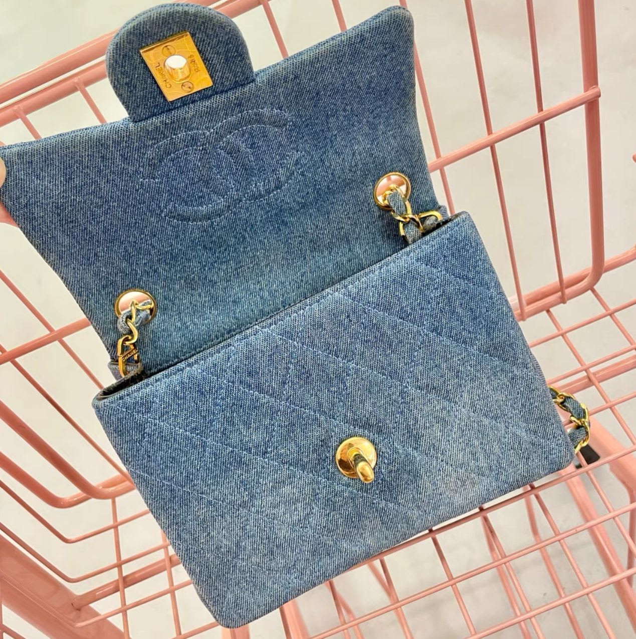 Chanel gold denim bag