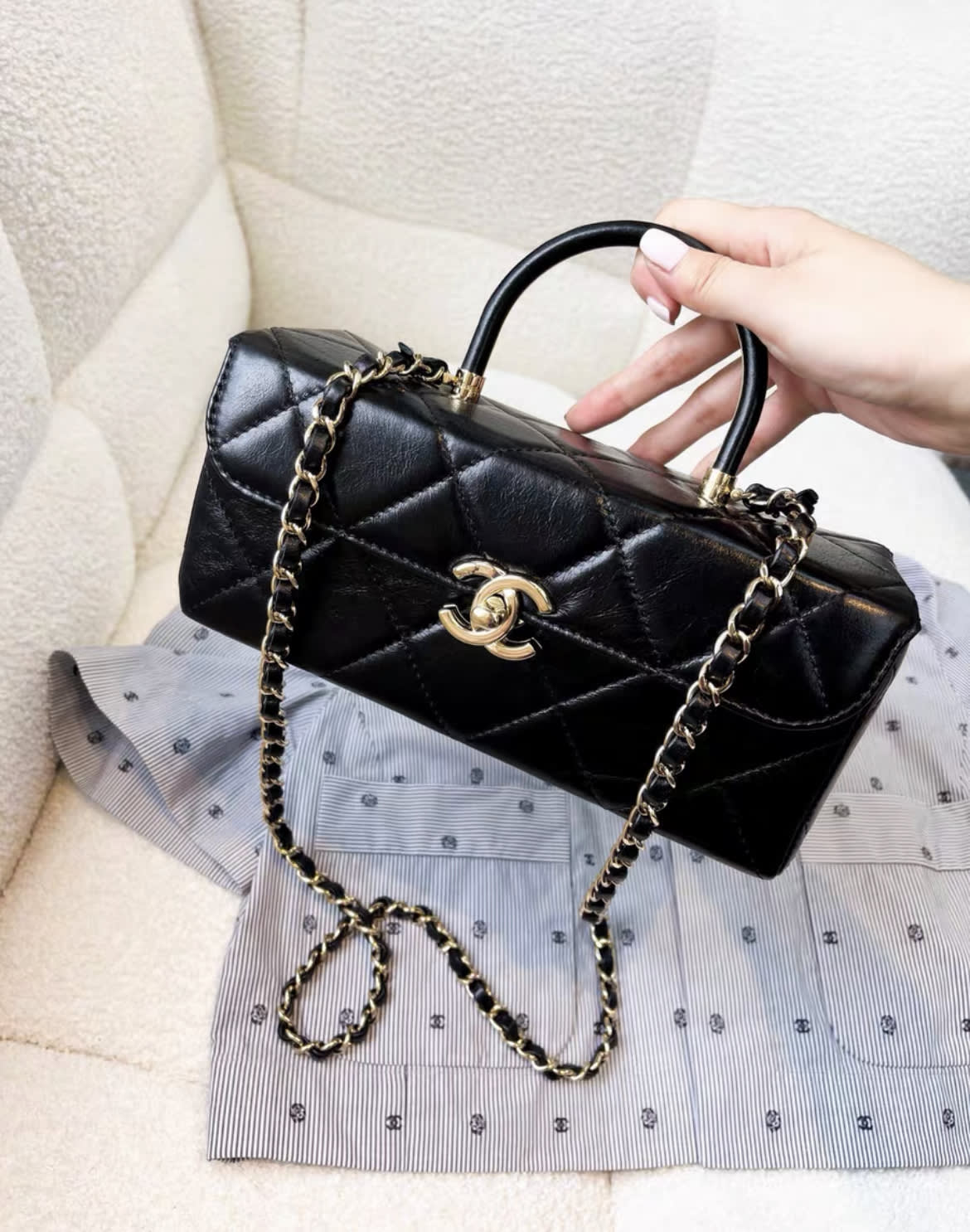 Chanel 23K waxed leather black gold long vanity bag