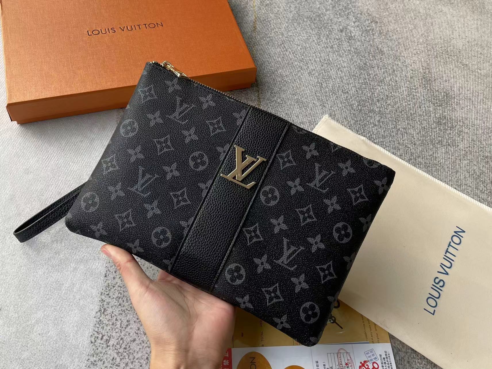 Louis vuitton handbag (wristlet bag)