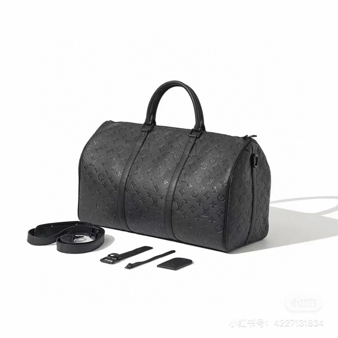 Louis vuitton handbags ( duffle, weekender,traveling)