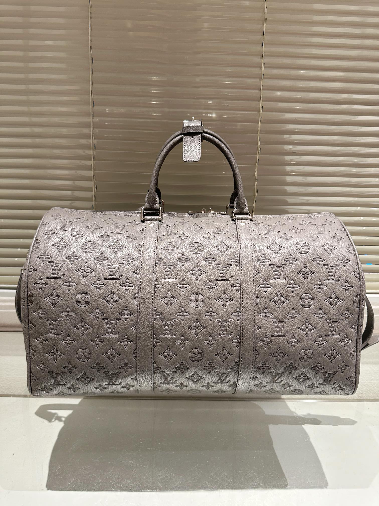 Louis vuitton handbags ( duffle, weekender,traveling)
