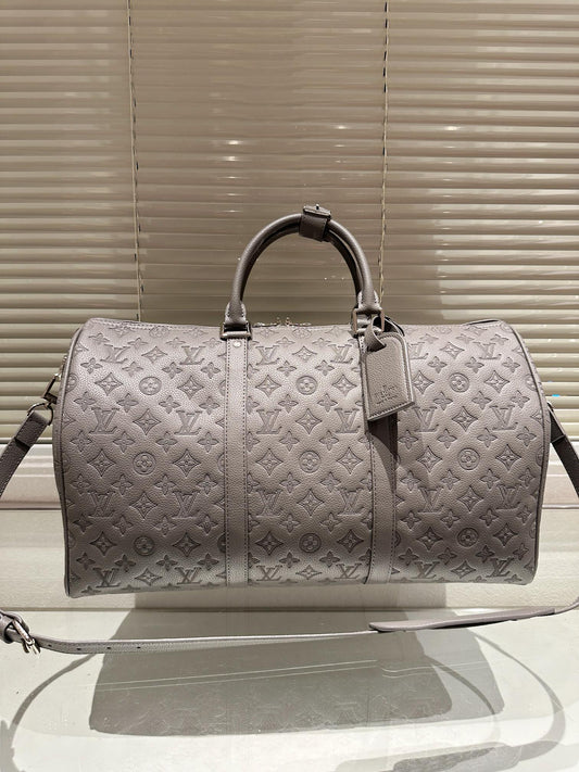 Louis vuitton handbags ( duffle, weekender,traveling)