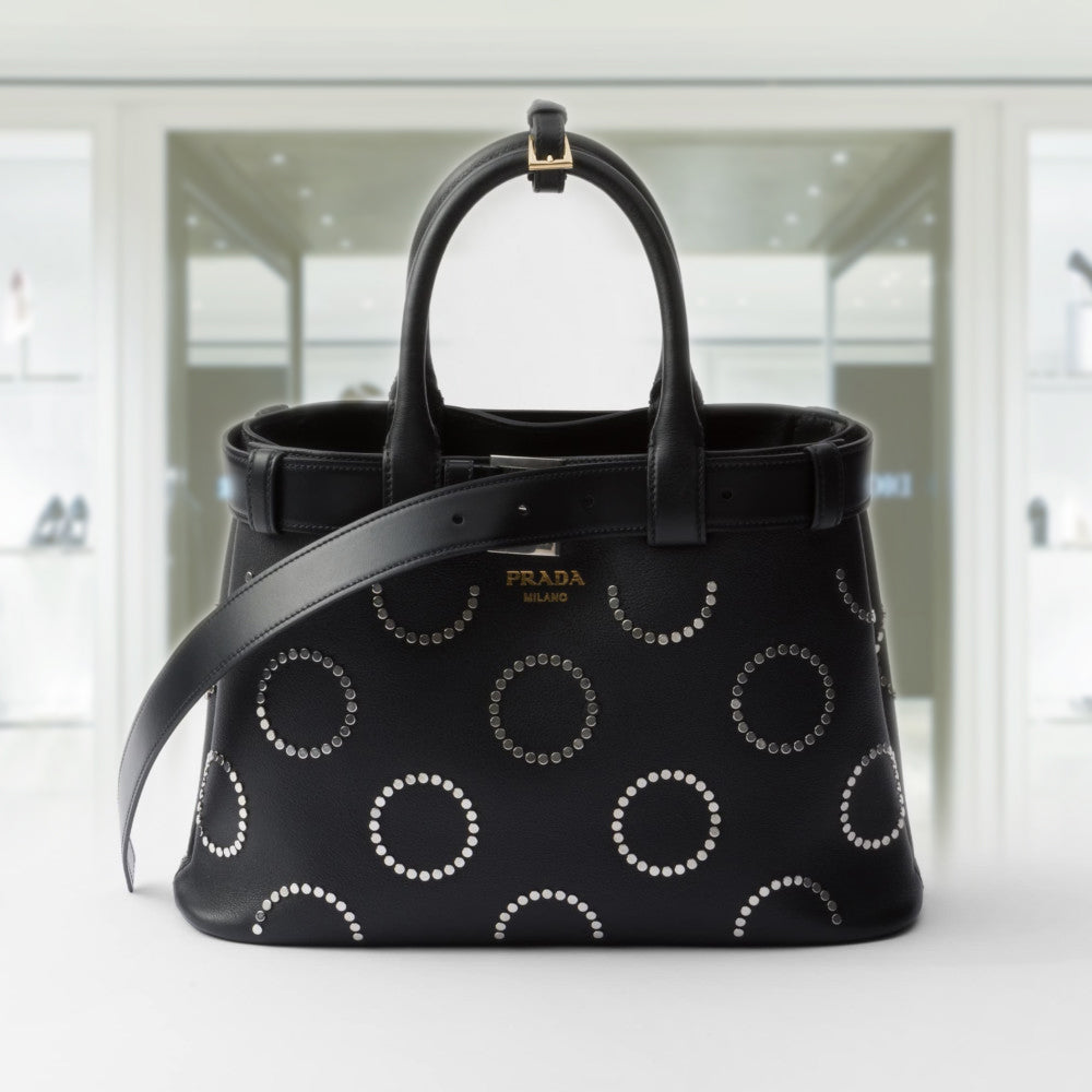 Prada Buckle medium leather bag with appliquÃ©s