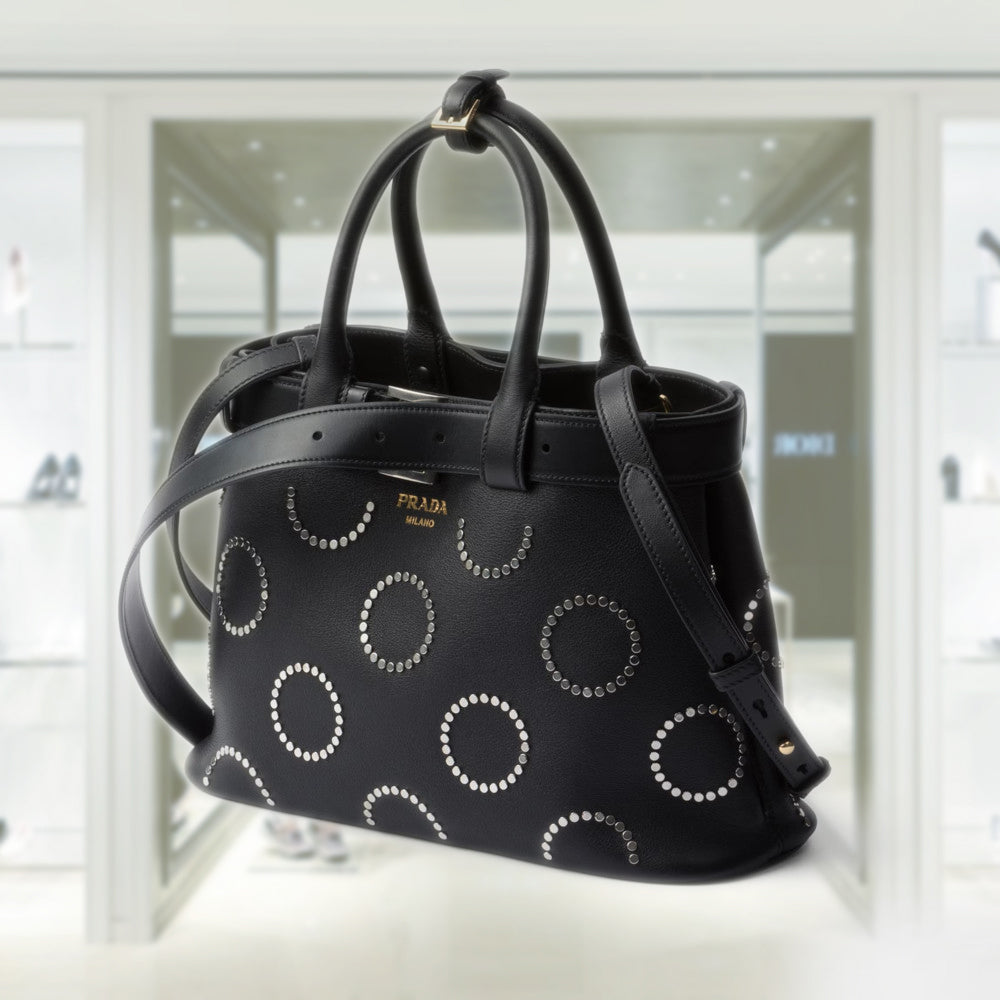 Prada Buckle medium leather bag with appliquÃ©s