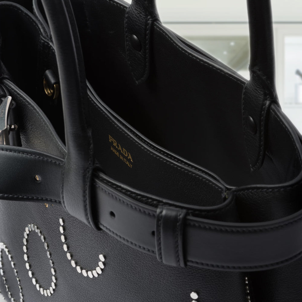 Prada Buckle medium leather bag with appliquÃ©s
