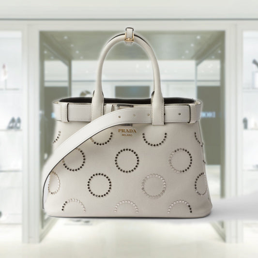 Prada Buckle medium leather bag with appliquÃ©s