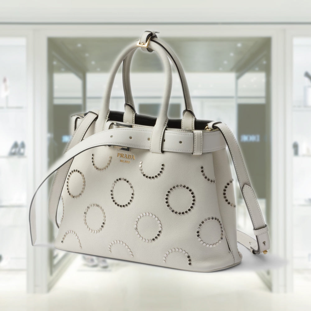 Prada Buckle medium leather bag with appliquÃ©s