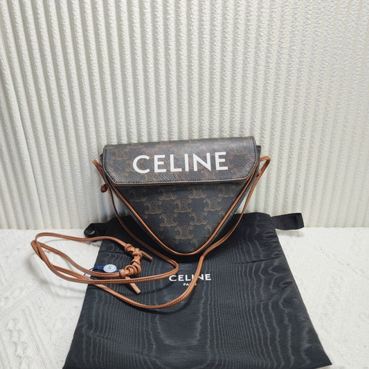 Luxury CELINE Triomphe Clutch in Brown Canvas