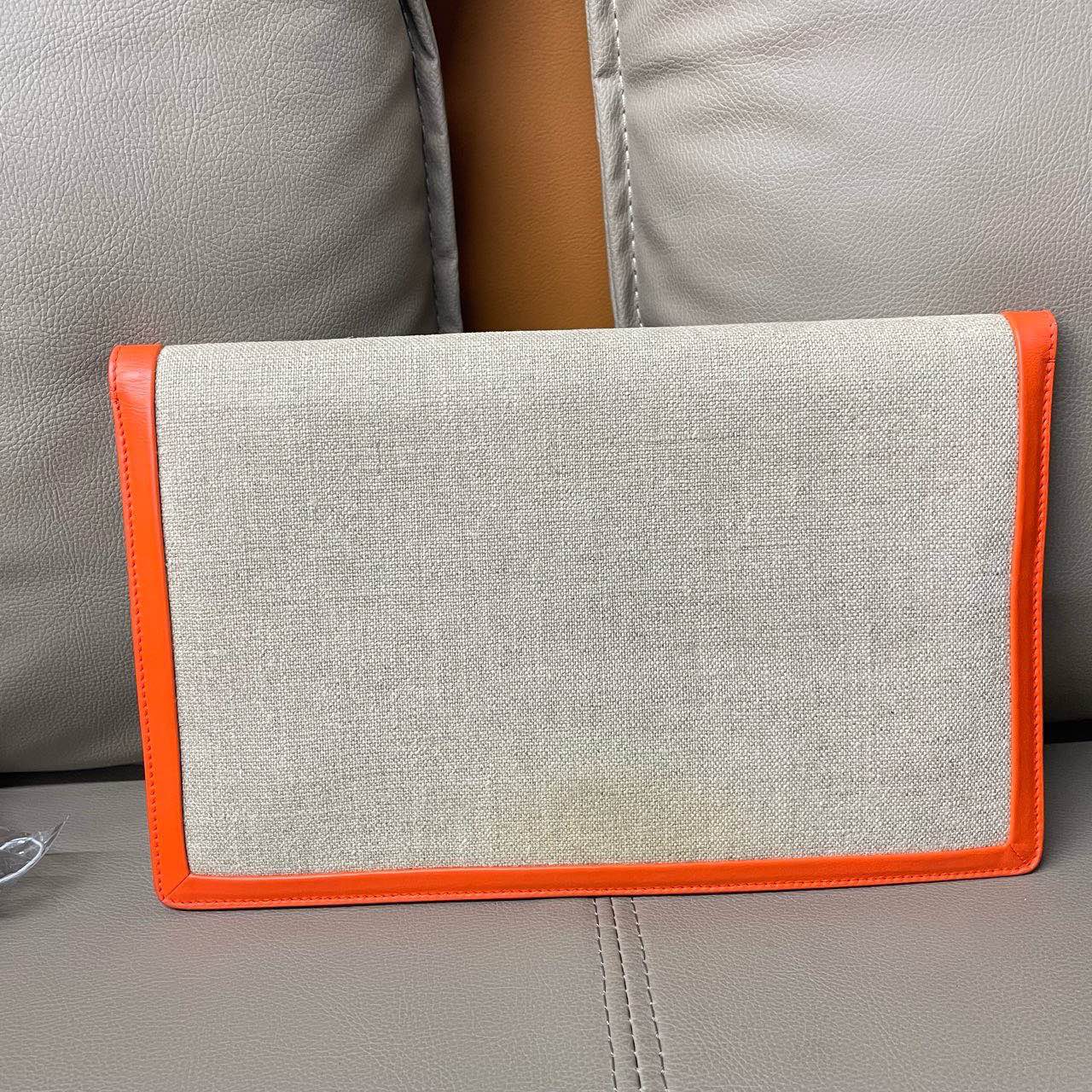New Luxury CELINE Clutch in Orange Canvas