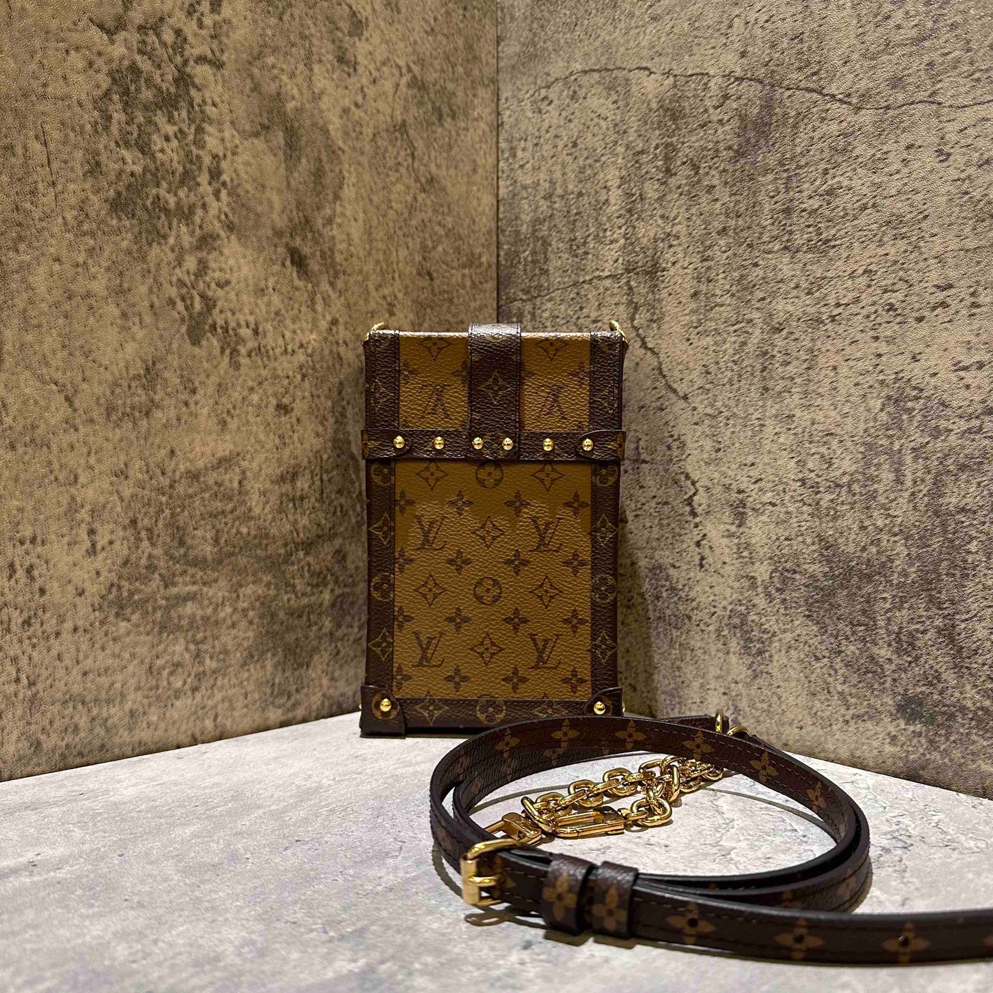 Louis Vuitton trunk vertical phone bag (microchip)
