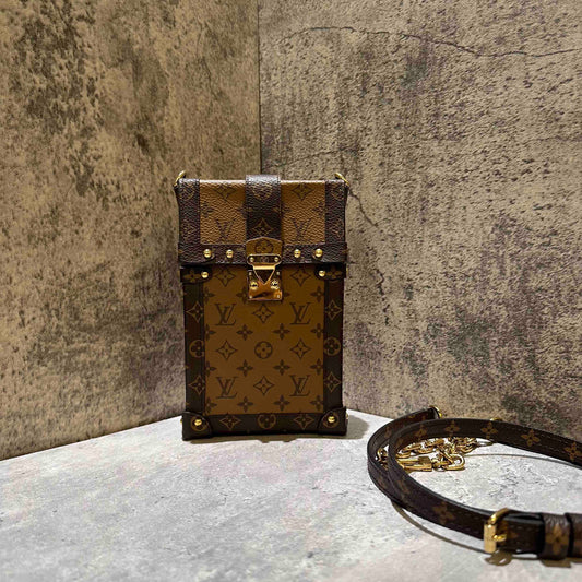 Louis Vuitton trunk vertical phone bag (microchip)